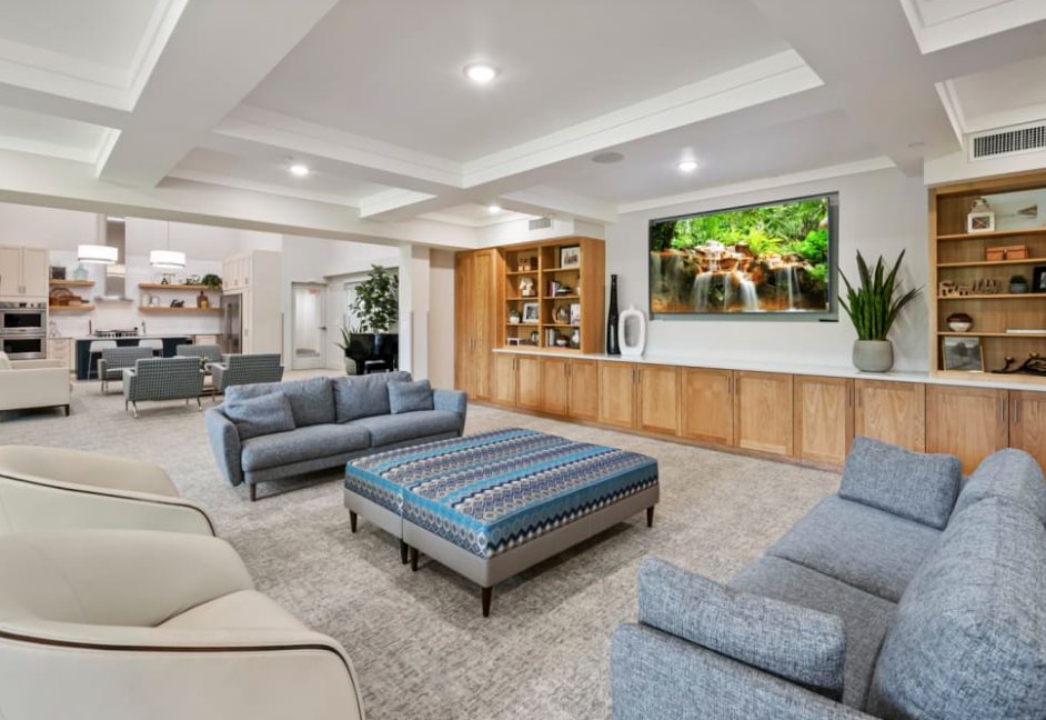 Colonial Court: Renovated clubhouse lounge with built-in media wall