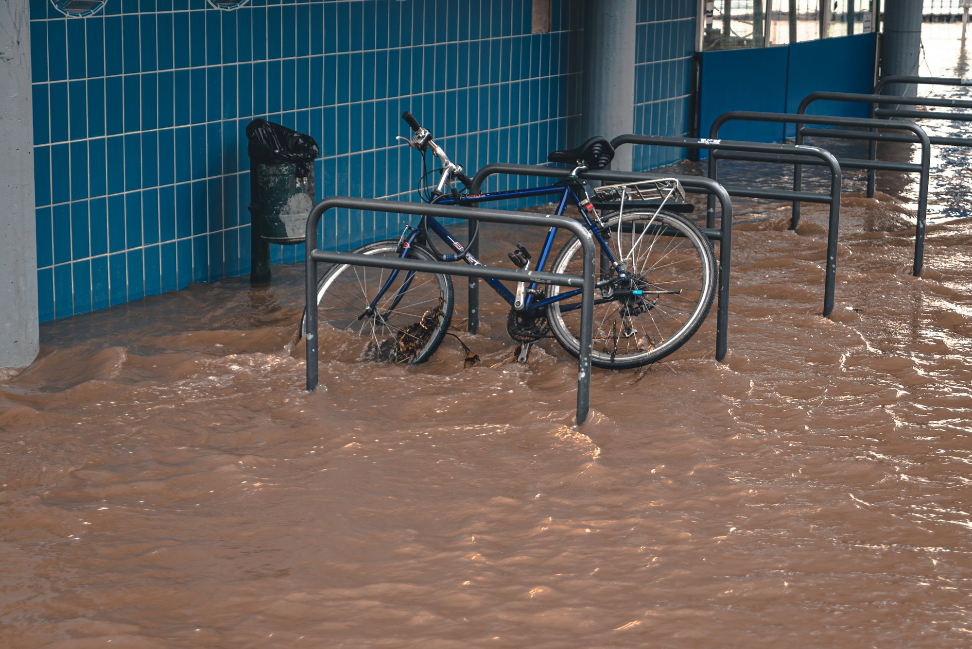 Flooded commercial corridor after a water loss