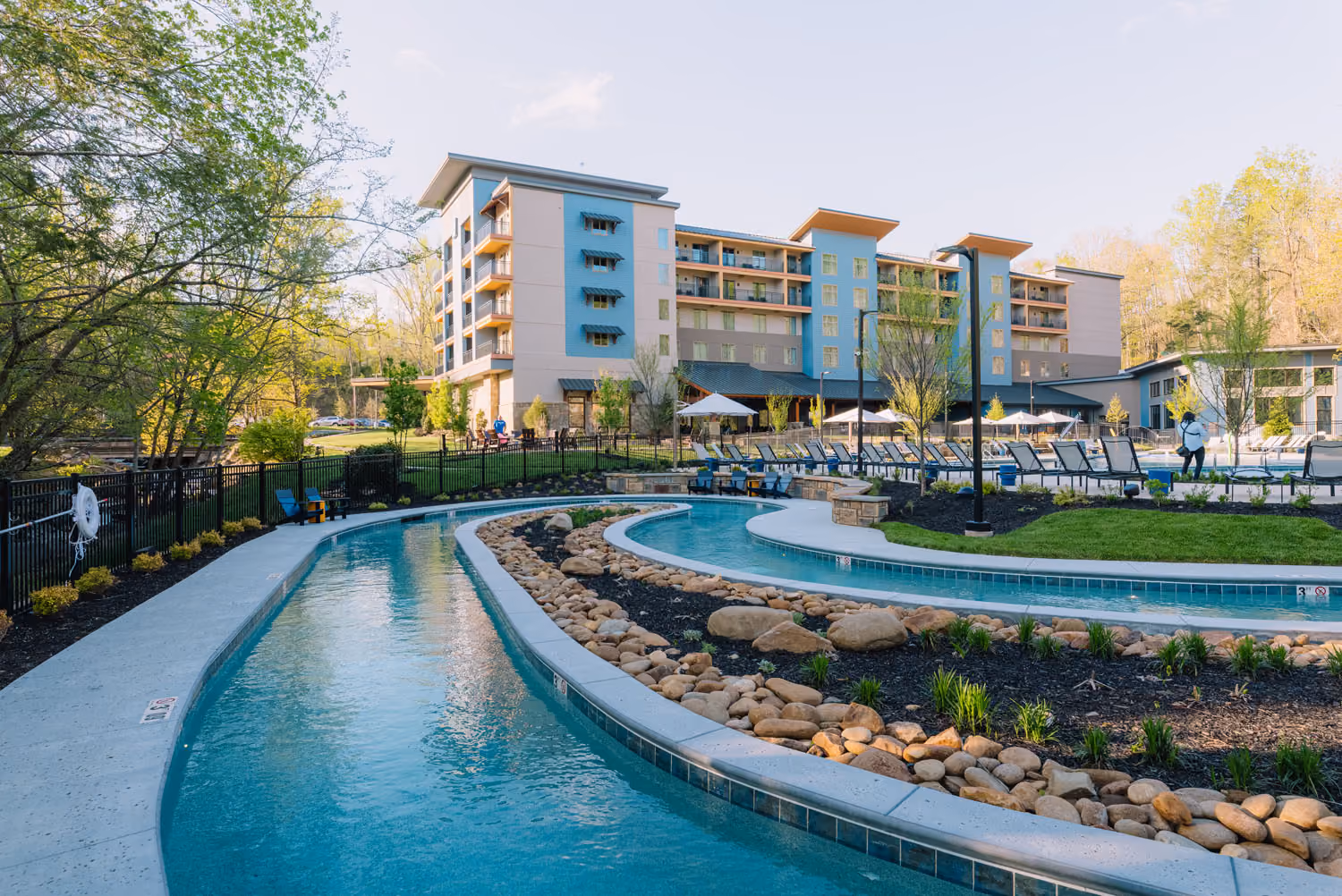 Hospitality construction project with a resort-style pool and multi-story building by D&S Builders