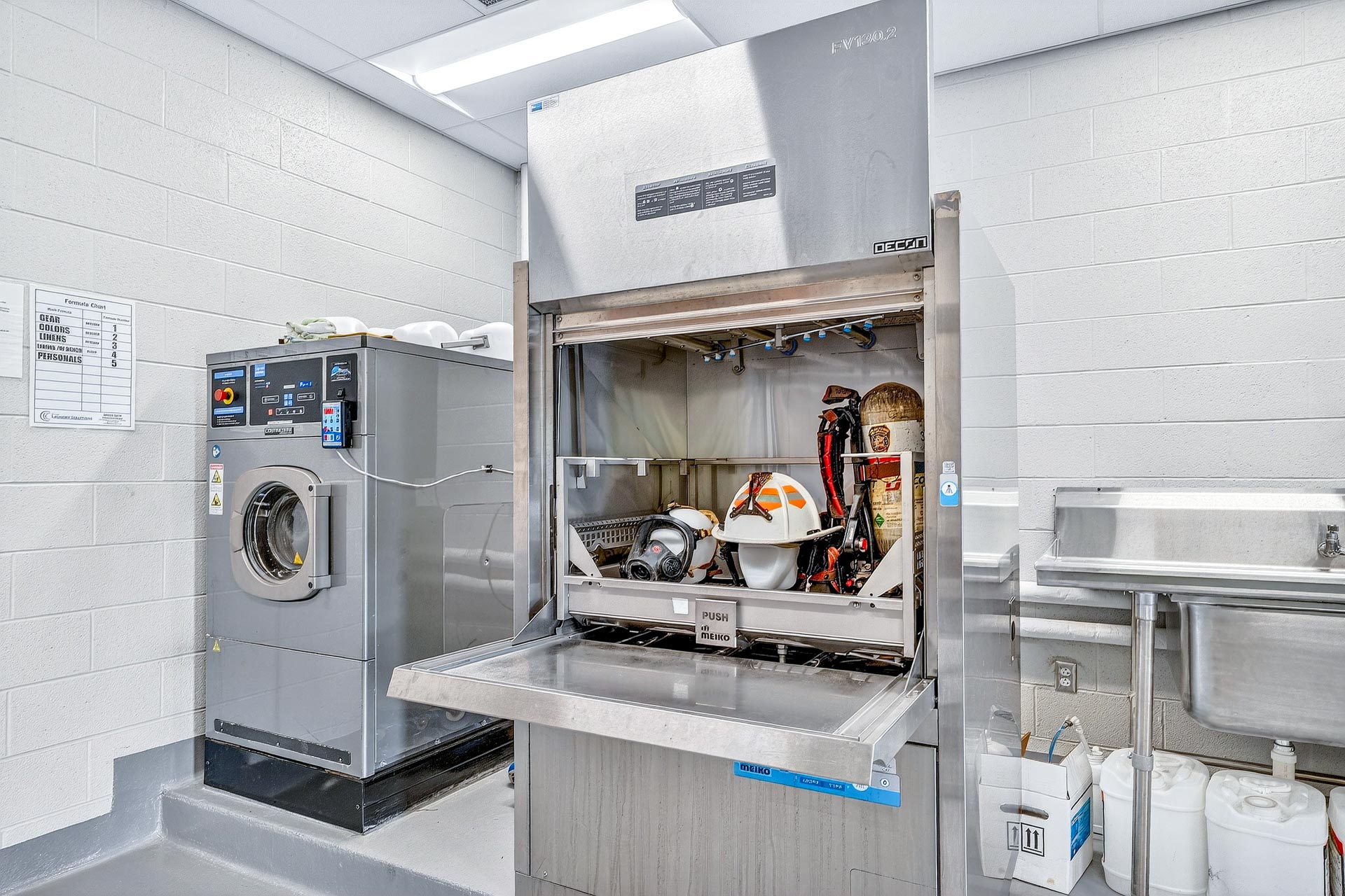 Commercial laundry room with industrial washer and dishwashing equipment, D&S Builders construction