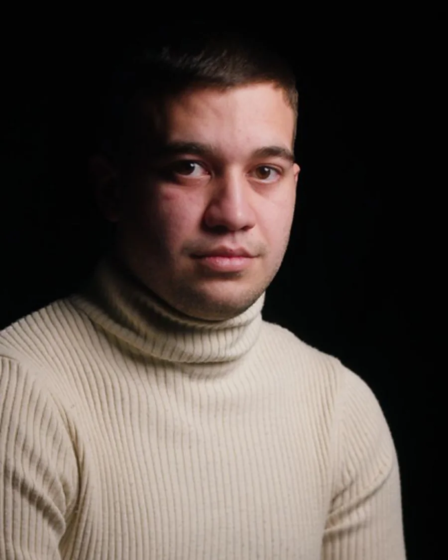 Nikola Jovanović, co-founder of CuliFlow, in a light turtleneck against a dark background