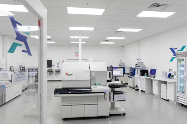 Main testing floor with analyzers and reagent storage