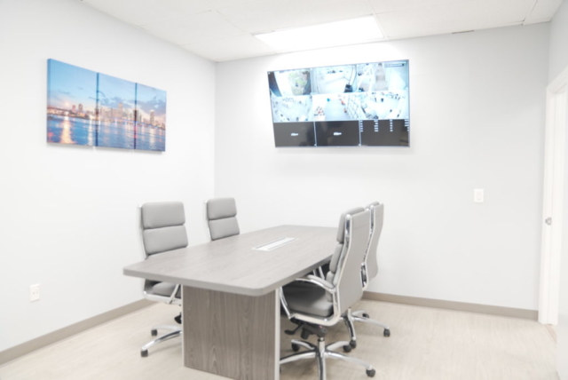 Conference room with live laboratory monitoring