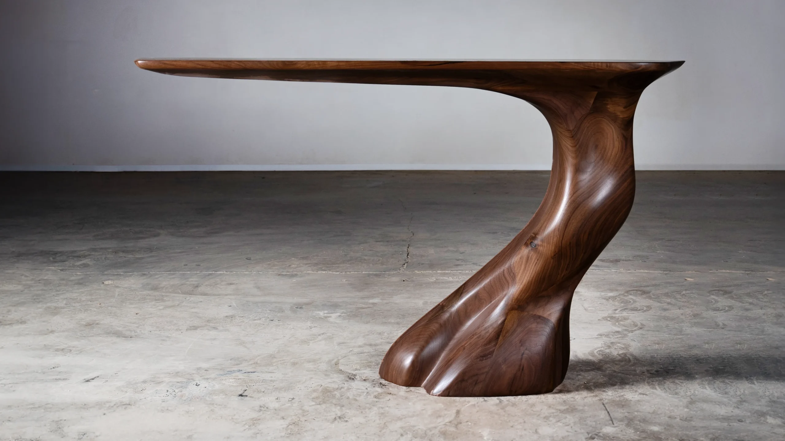 Sculptural solid wood console table Frolic by Amorph Studio