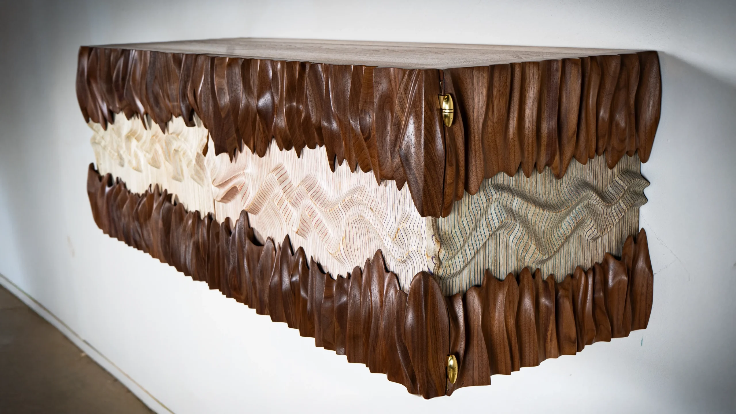 Sculptural solid wood wall mounted cabinet Novia by Amorph Studio