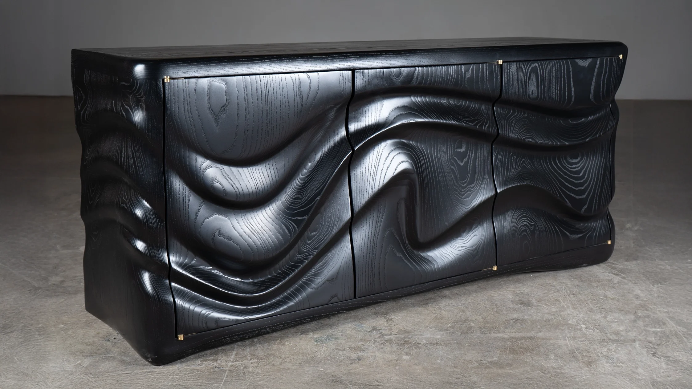 Sculptural solid wood cabinet Xena in black lacquer by Amorph Studio