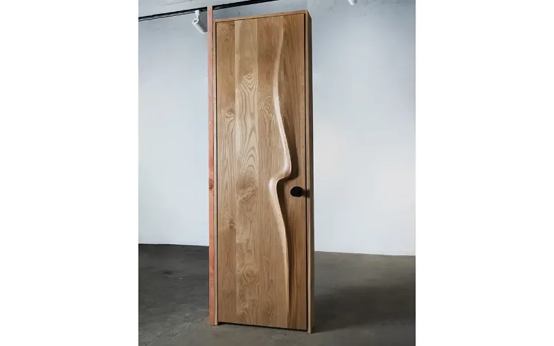 sculptural interior door handcrafted by Amorph