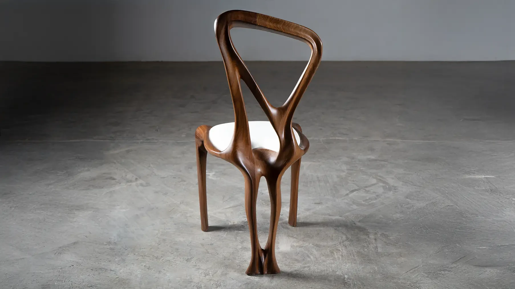 Sculptural solid wood chair Gazelle by Amorph Studio