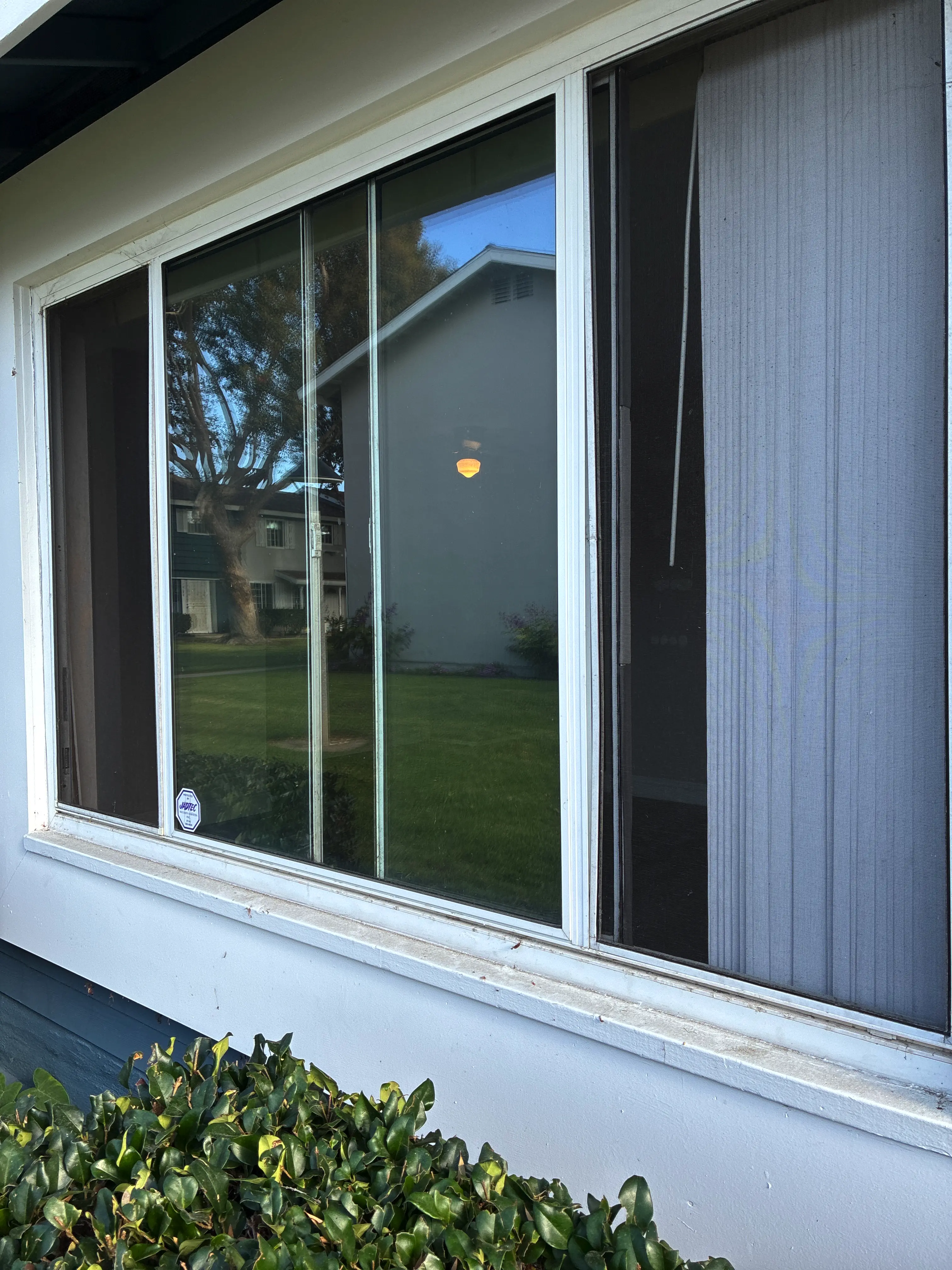 Before: foggy window glass with a failed seal