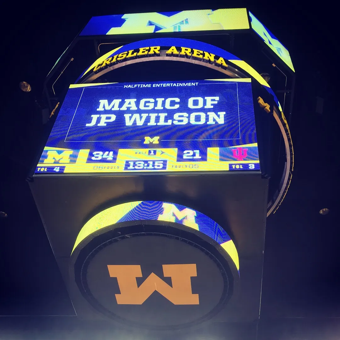 "Magic of JP Wilson" halftime billing on the Crisler Arena scoreboard, Michigan vs. Indiana