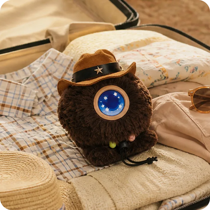 A brown Mumuland companion wearing a cowboy hat