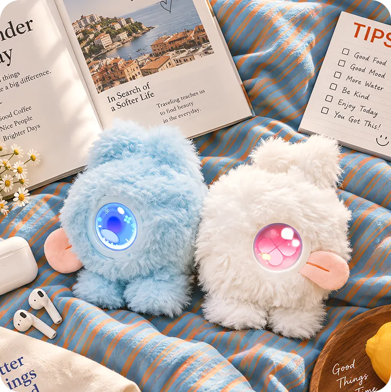 Two Mumuland companions on a striped blanket