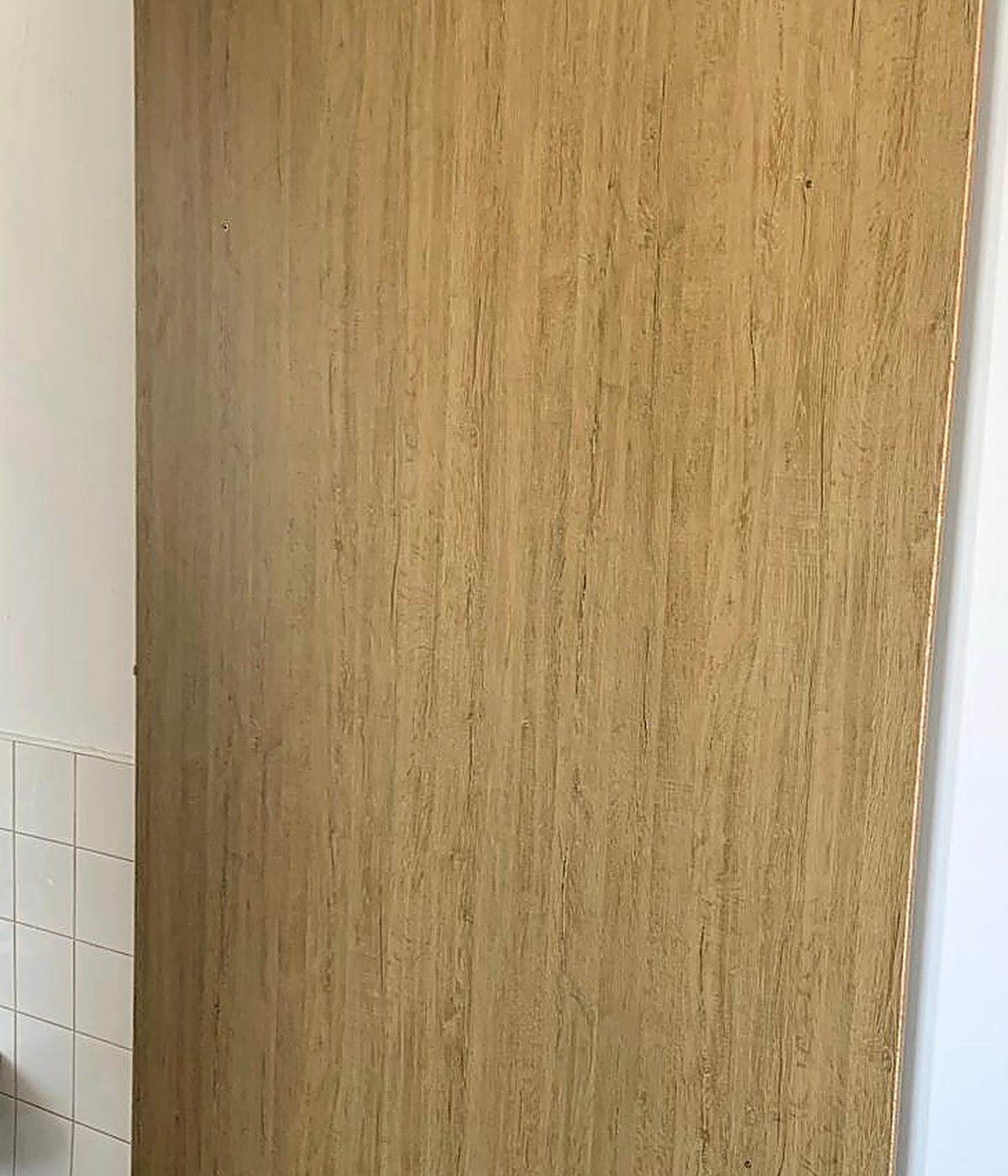Holzfassade mit natürlicher Patina als Beispiel für bewusst geplante Alterung im Holzbau