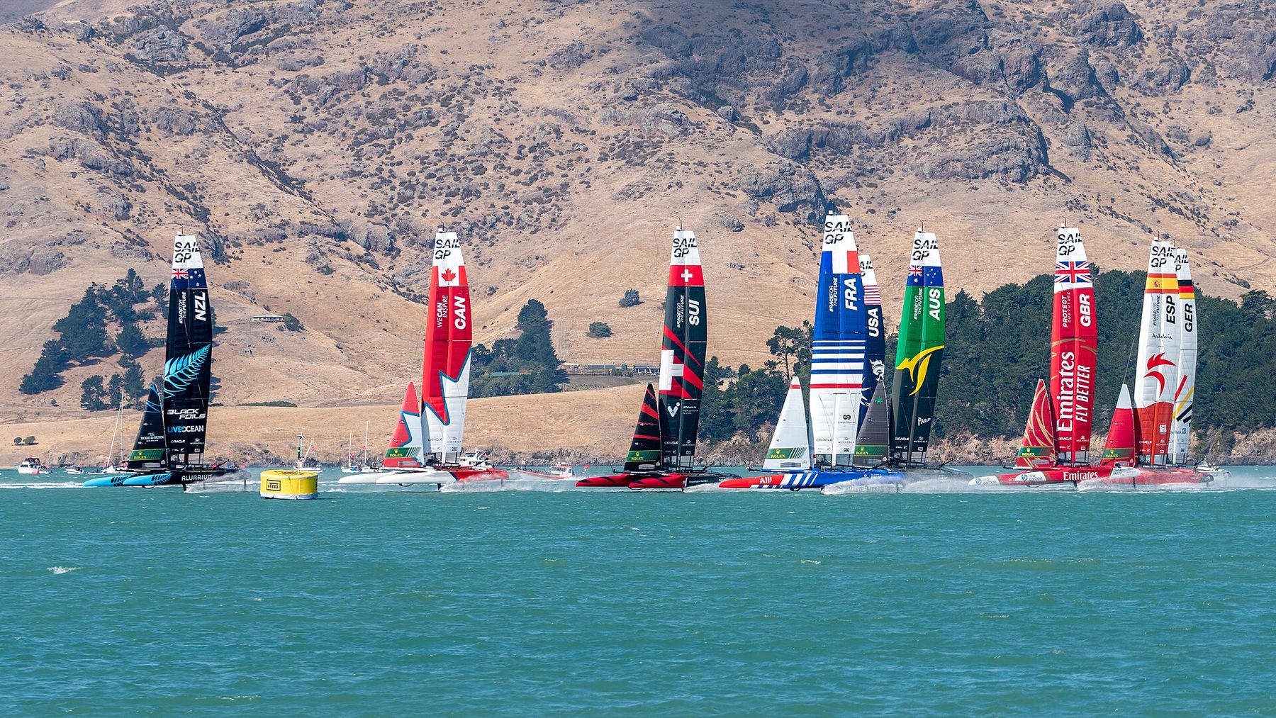 The SailGP fleet of F50 catamarans lined up at the start in Christchurch