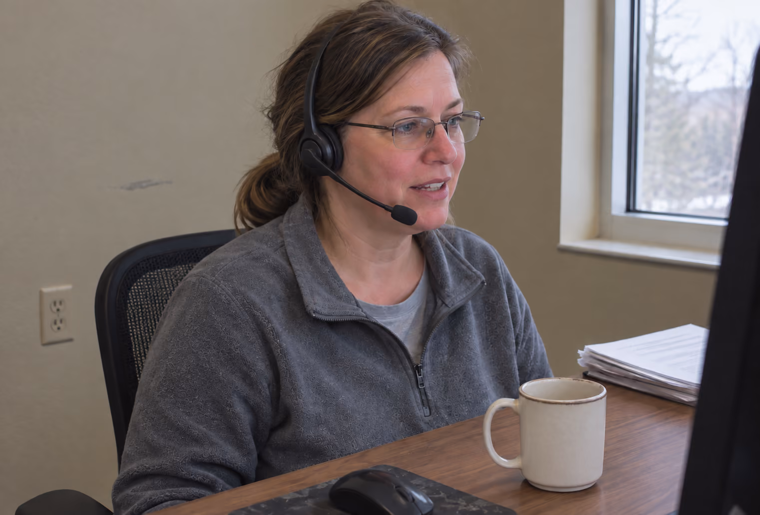 Affiniti support agent on a headset call