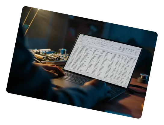 Printed spreadsheet next to a calculator