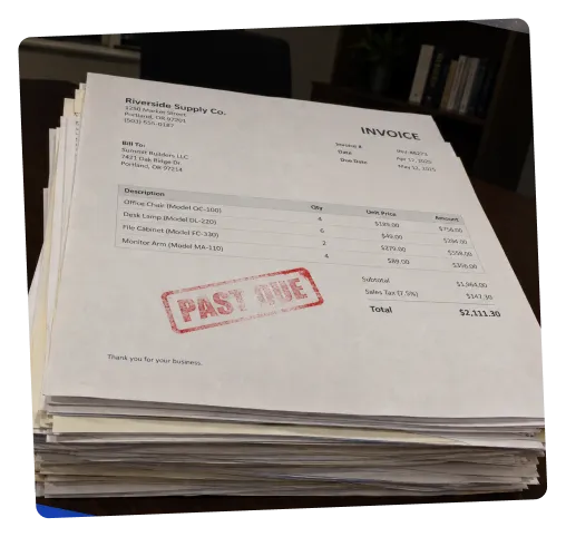 Stack of paper invoices stamped past due