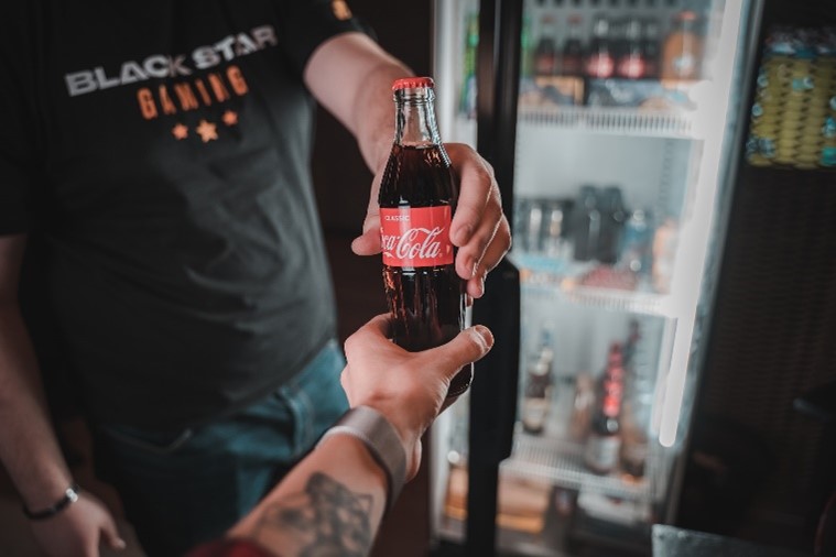 Two Share a Coke bottles side by side