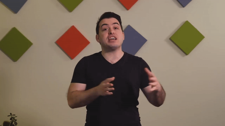 Speaker using both hands to show two contrasting ideas