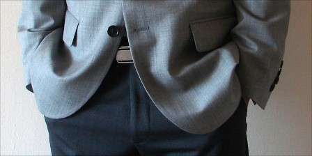 Person with hands in their pockets