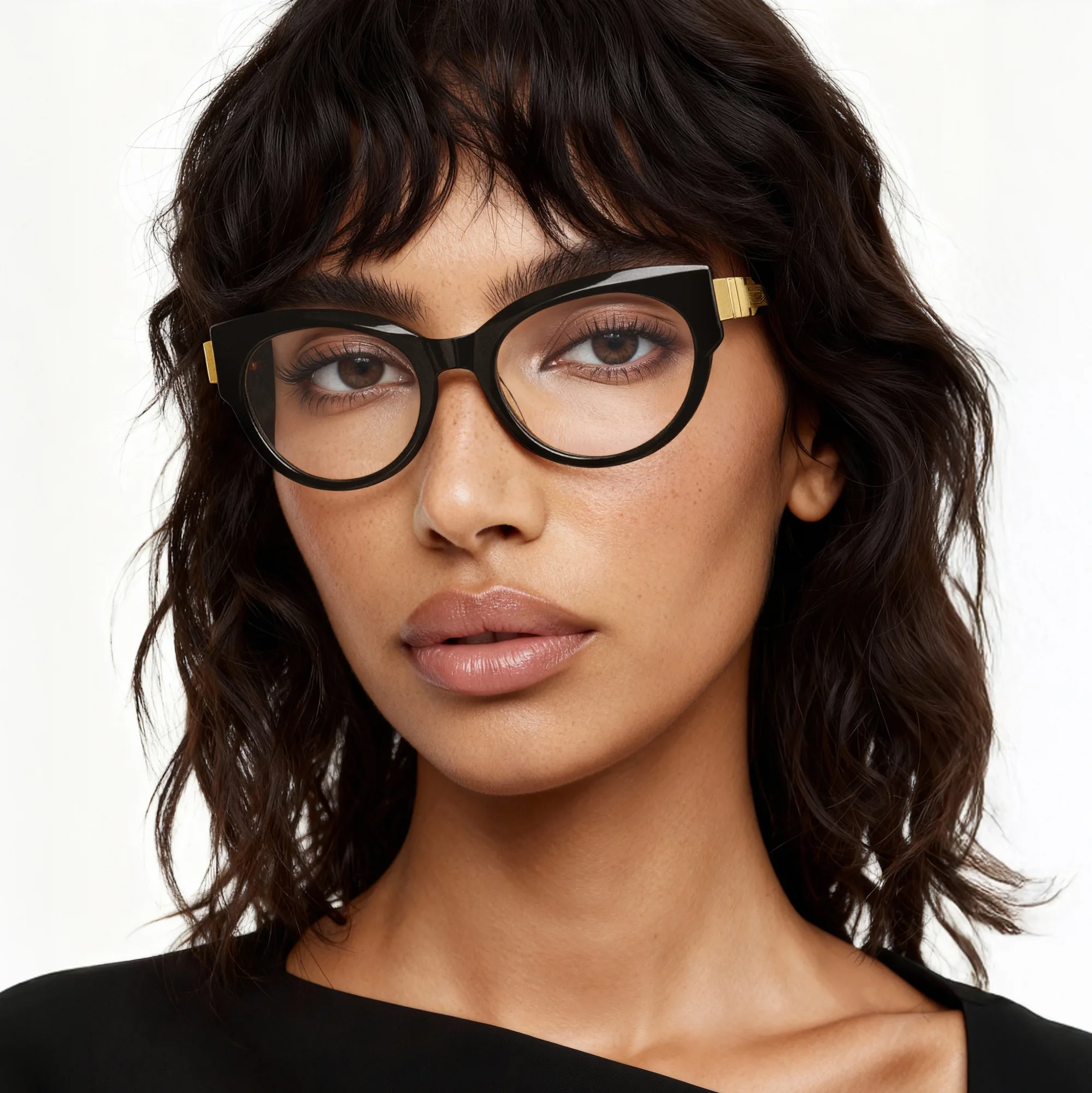 Close-up portrait in black cat-eye glasses