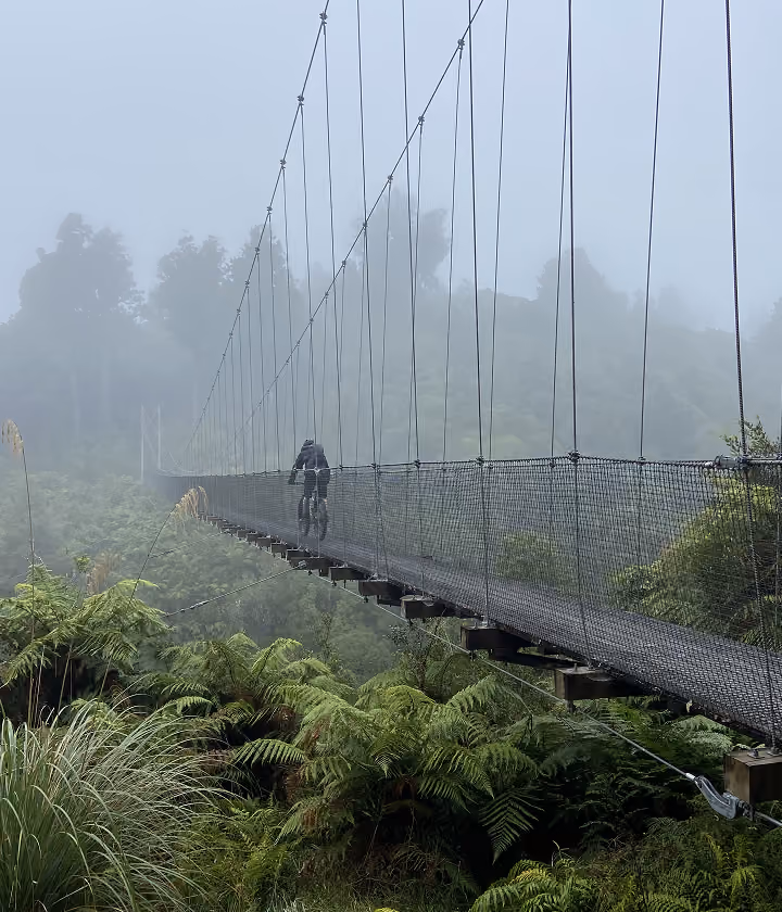 Cyclist riding in the rain