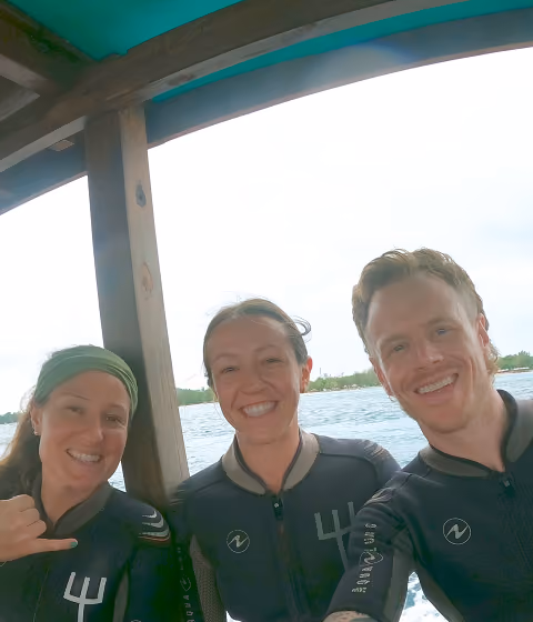 A group of friends about to scuba dive