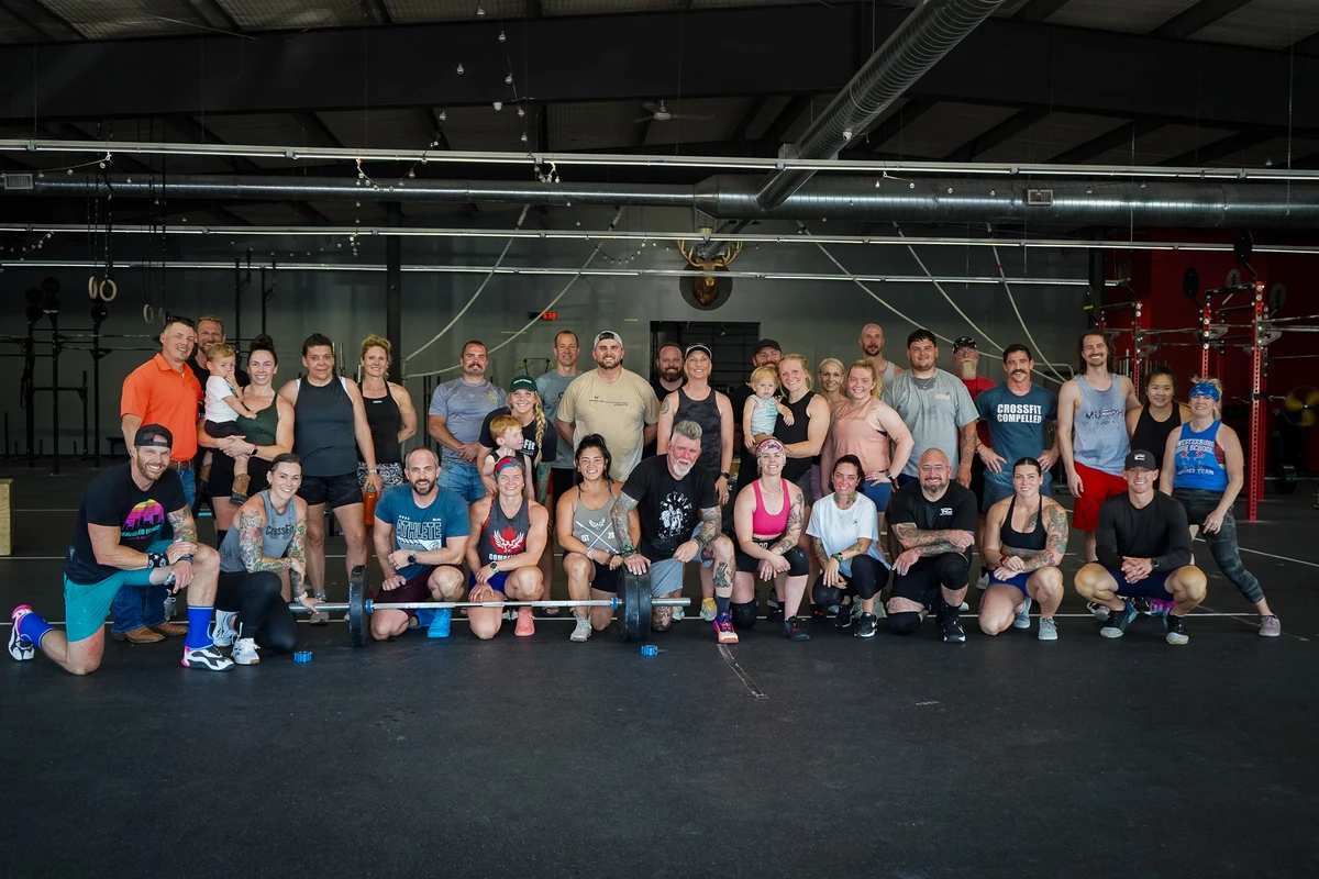 Compelled Fitness members and coaches gathered together at the gym