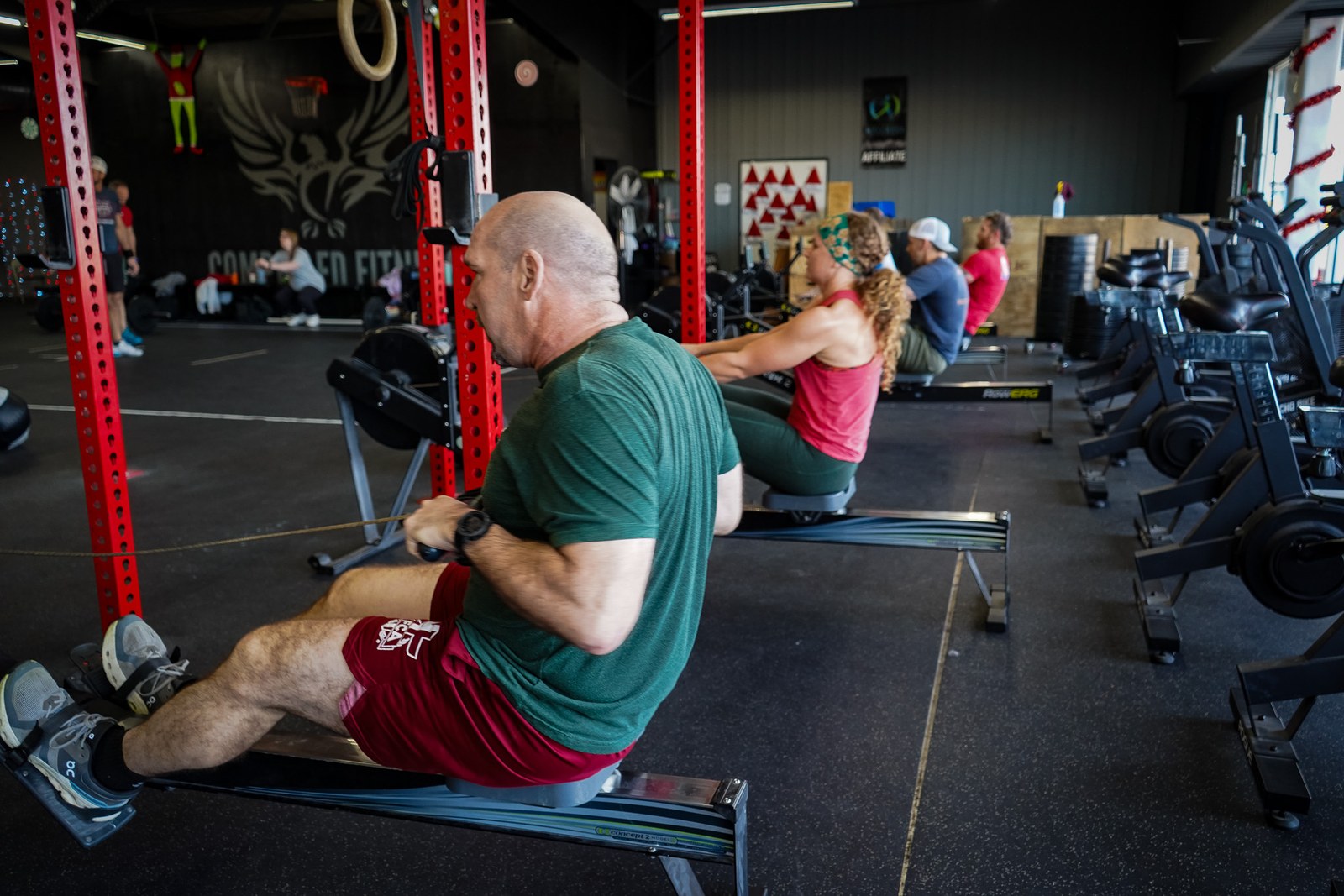 Compelled Fitness members training together in the gym
