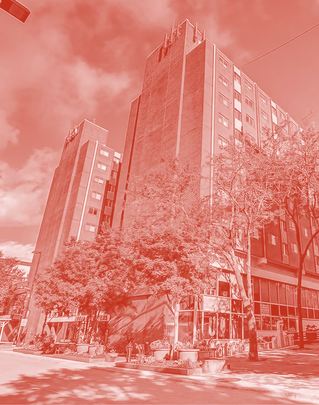 The Buckner tower on North Frances Street in a red duotone