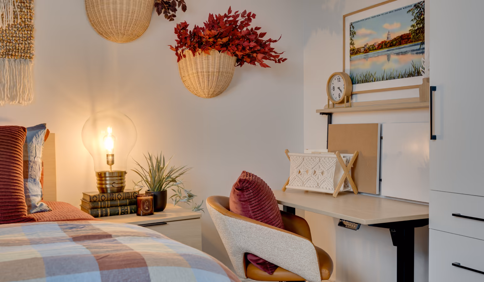 Buckner bedroom with a quilted bed, standing desk and chair