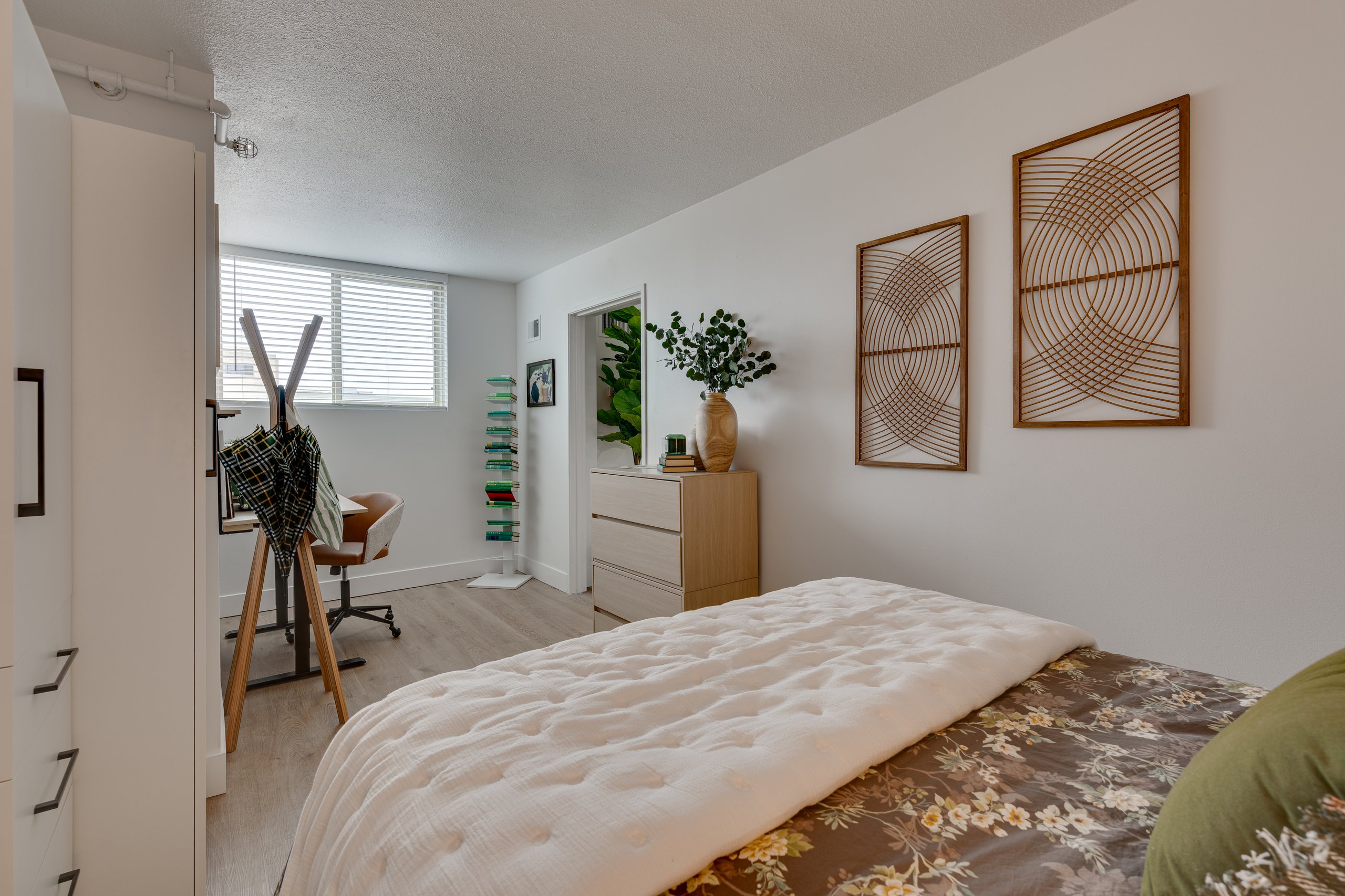 Bedroom with full-size bed in a Buckner student apartment, Madison, WI