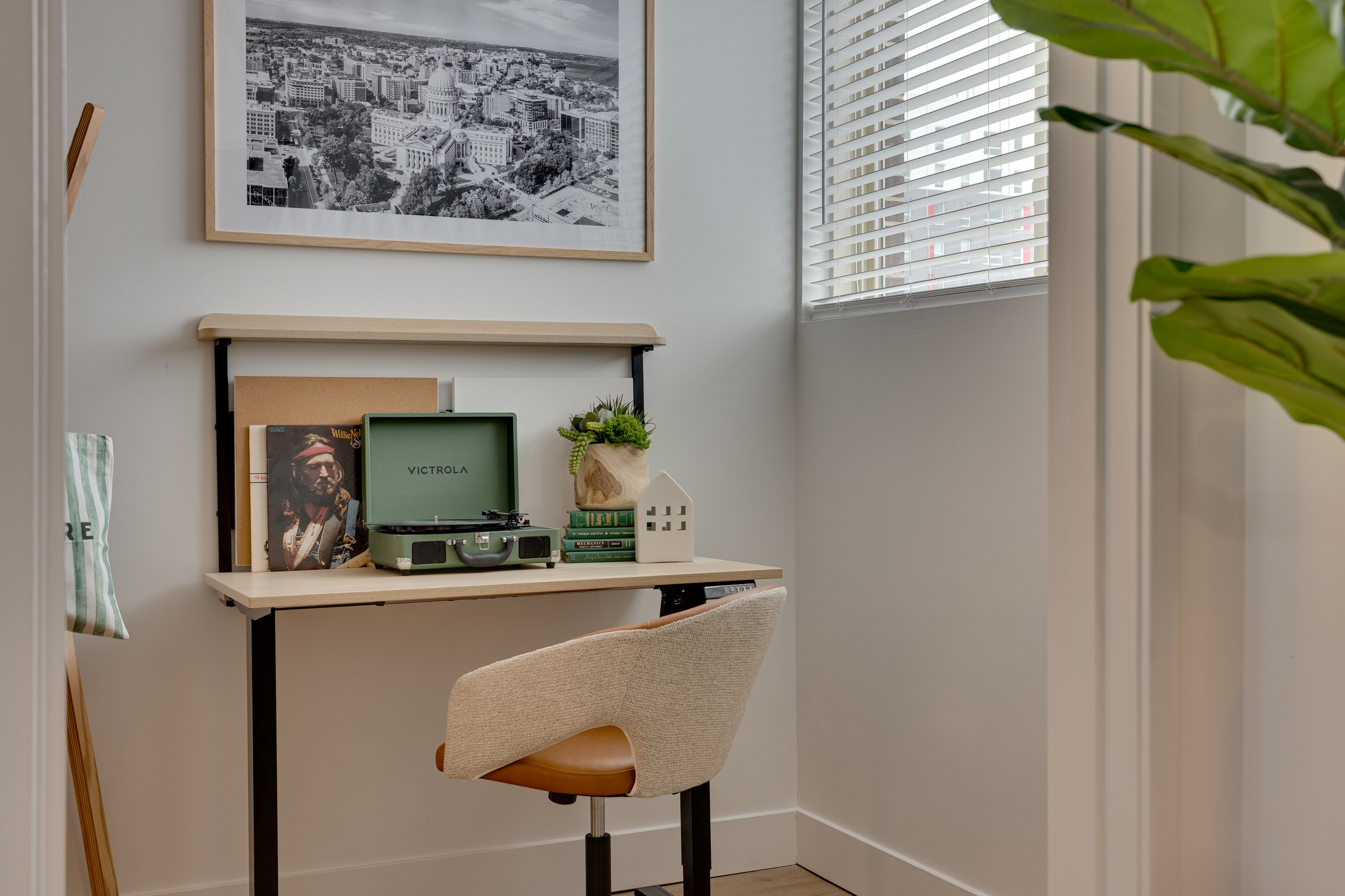 Study nook with desk in a furnished Buckner student apartment