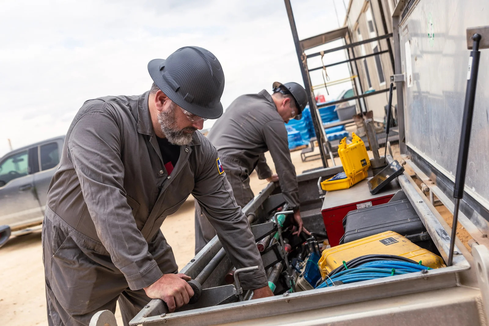 Field technicians installing Acura HazLoc hardware
