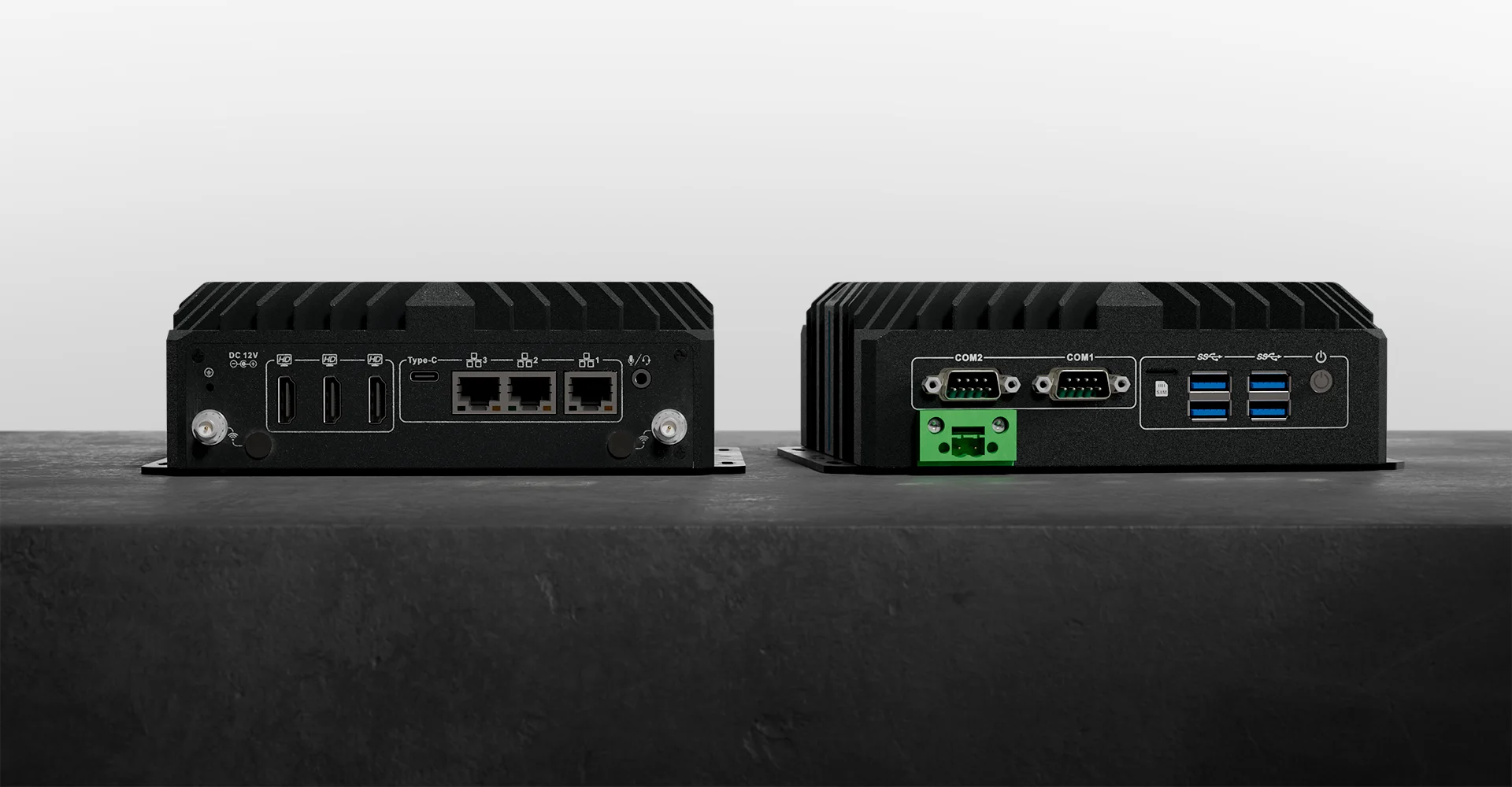 PowerBrick DV front and rear I/O on a concrete ledge