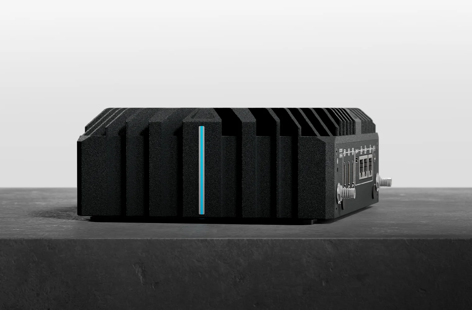 PowerBrick DV fanless computer on a concrete ledge