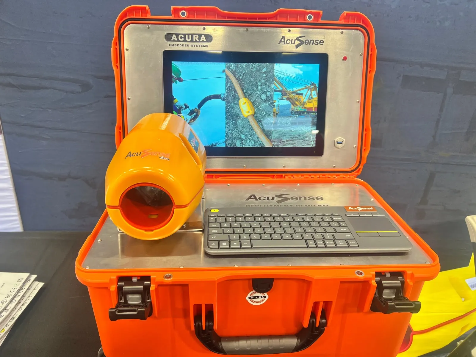 AcuSense demo kit with an Acura rugged display showing a cable on site