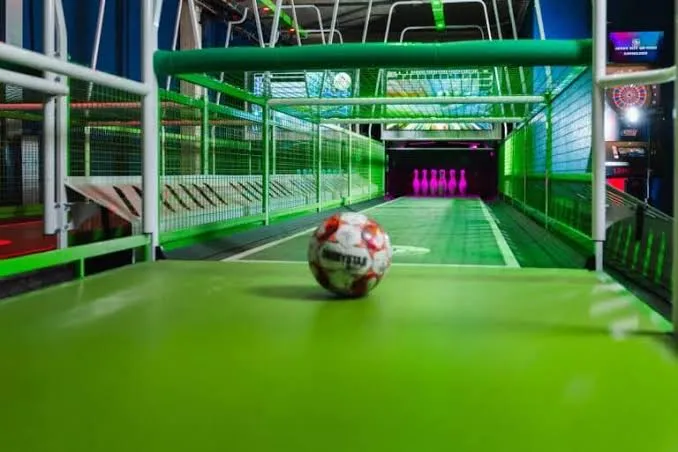 Soccer bowling lane with pins at TURF ATX
