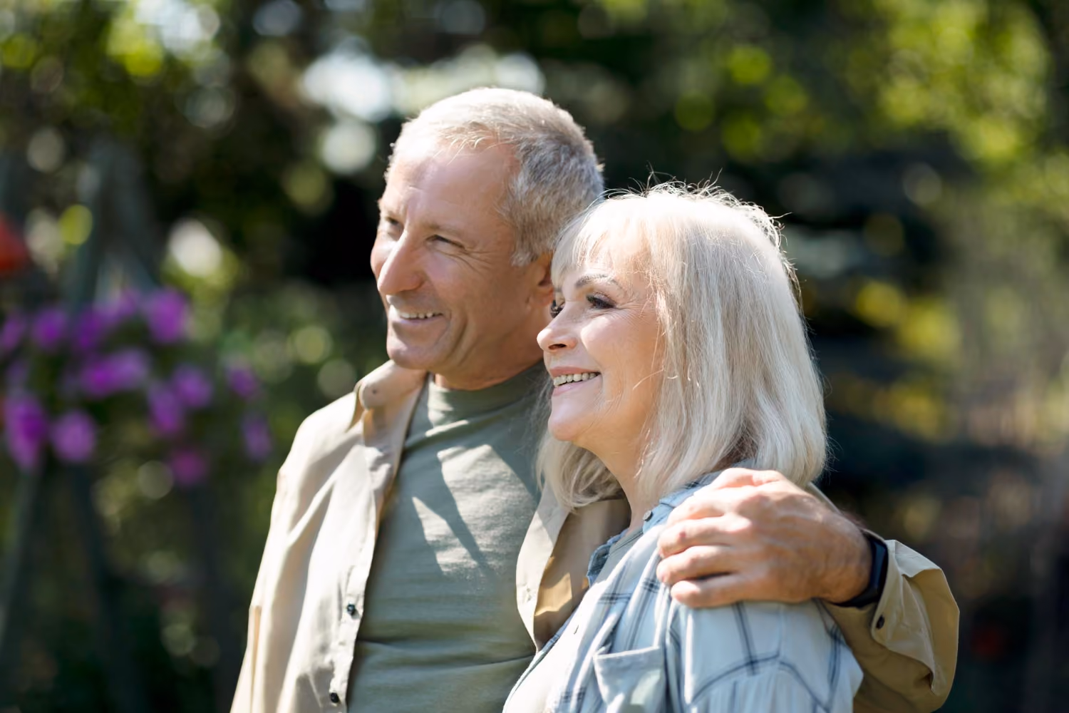 A happy retired couple embracing