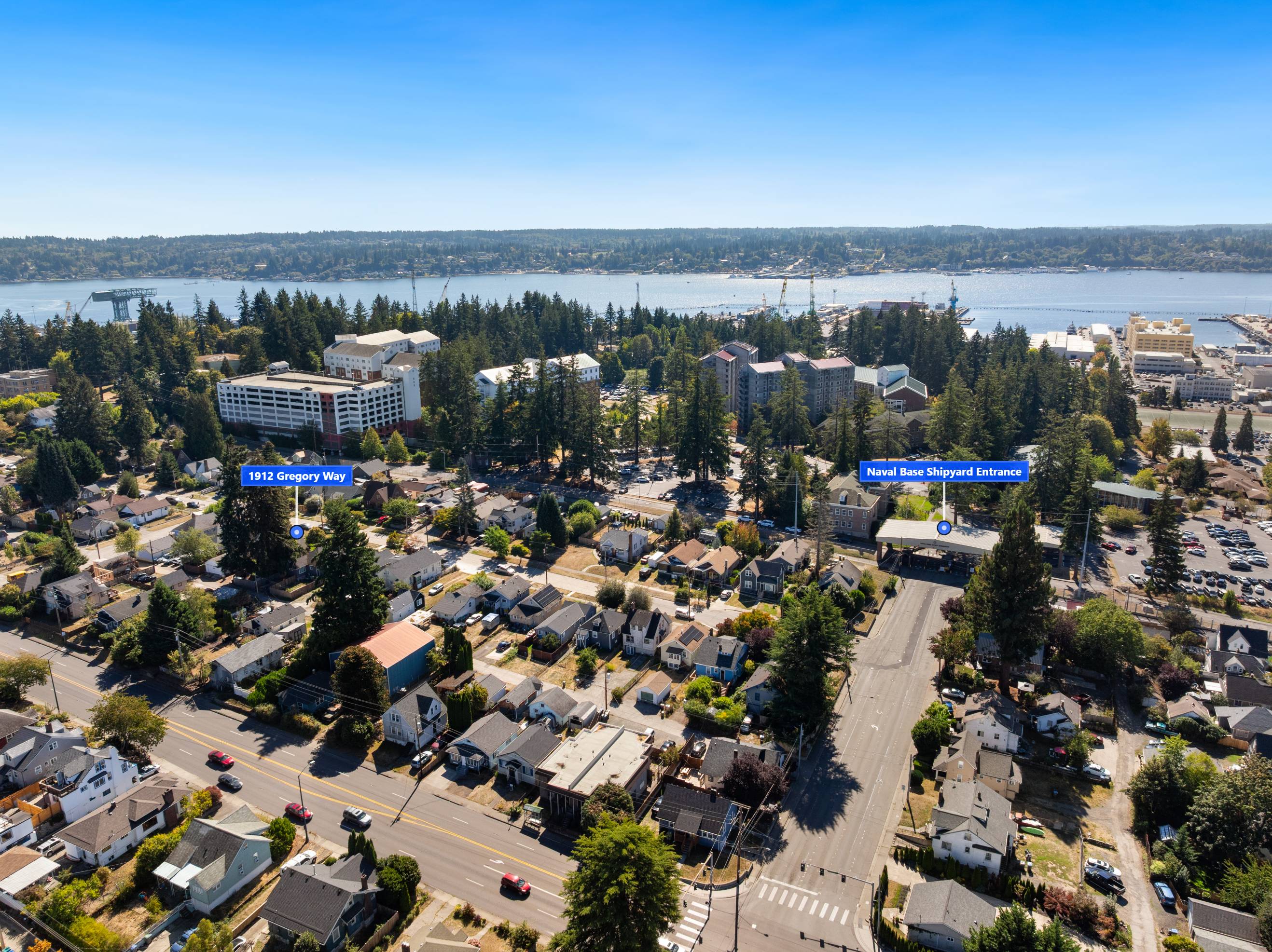 Drone aerial over a Kitsap neighborhood to open water