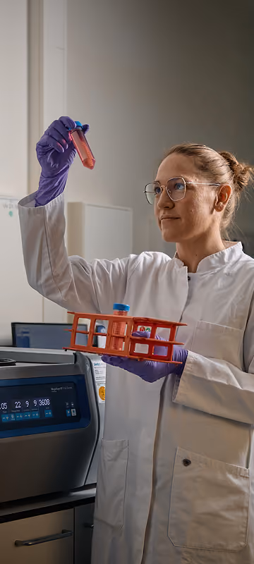 Female scientist viewing a sample in the lab
