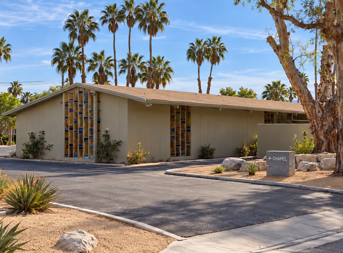 The 1963 chapel attributed to Albert Frey, now part of a Wiefels funeral home in Palm Springs: a low, gabled building with tall panels of colorful geometric glass set into its tan walls, beside a Chapel sign, palm trees and a large old tree