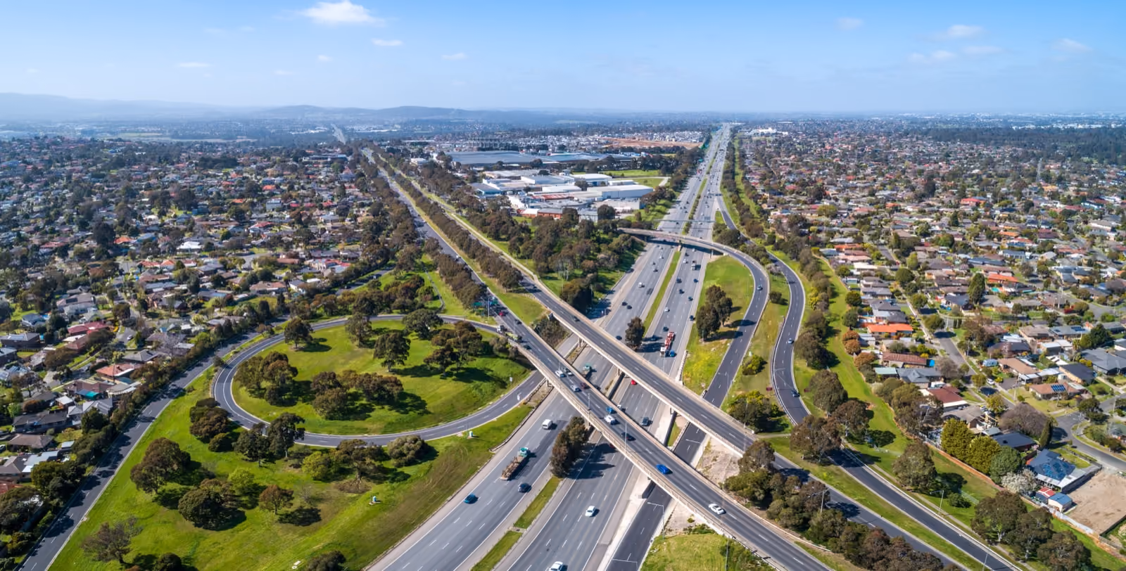 Aerial view of a motorway interchange with freight traffic