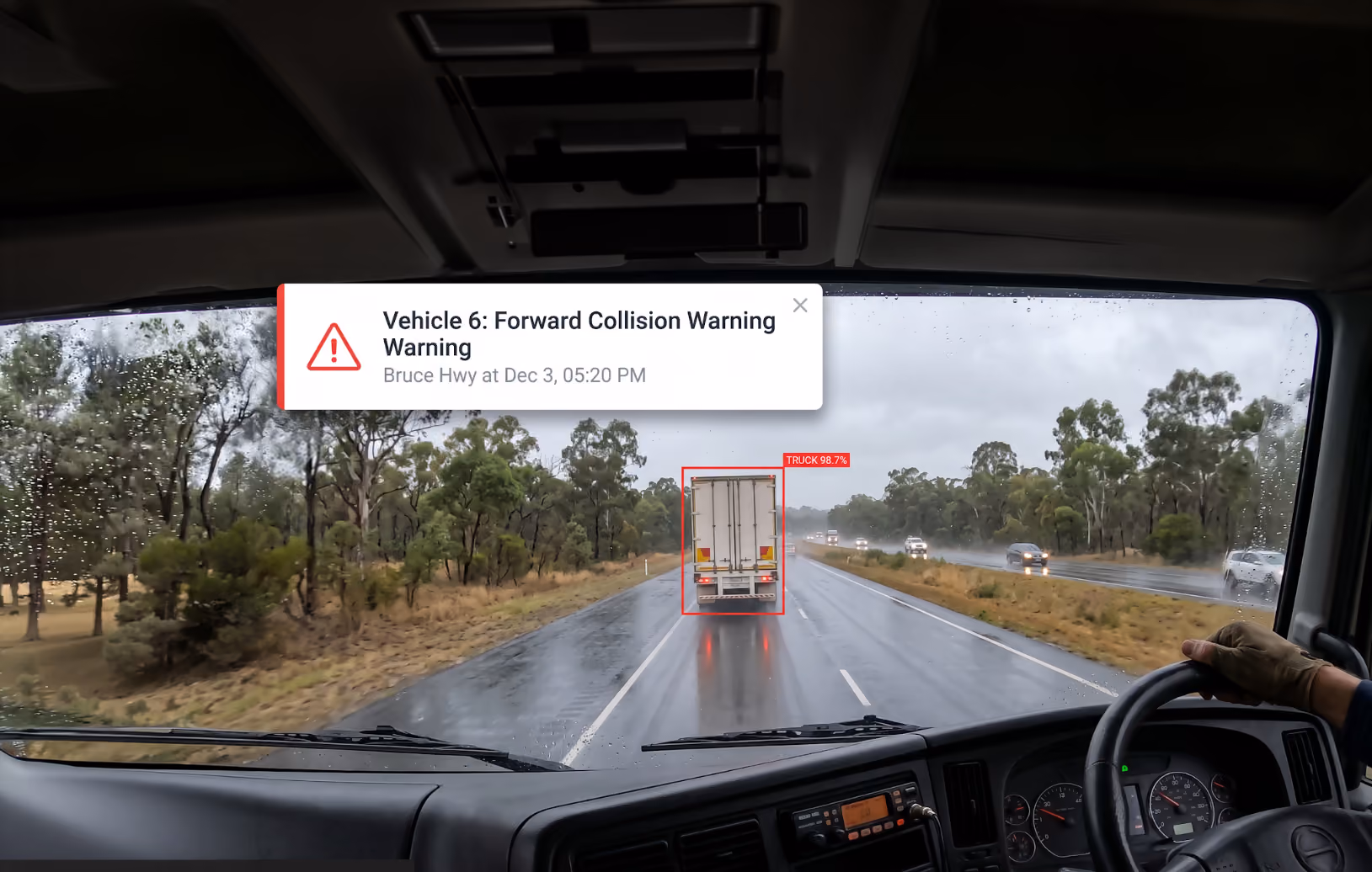In-cab view of a forward collision warning alert for Vehicle 6 on the Bruce Hwy
