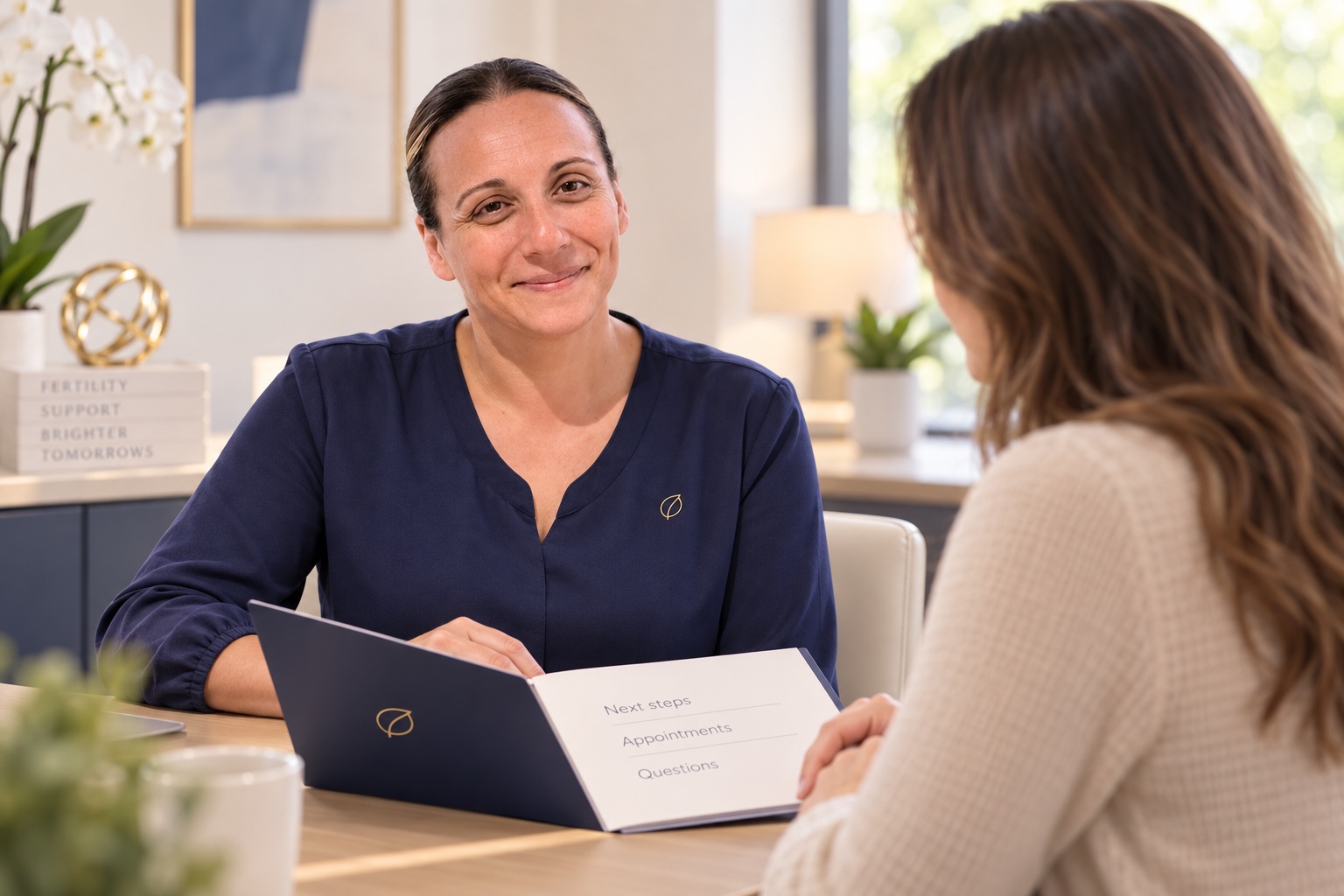 Susana Seidl guiding a patient through appointments, questions, and next steps