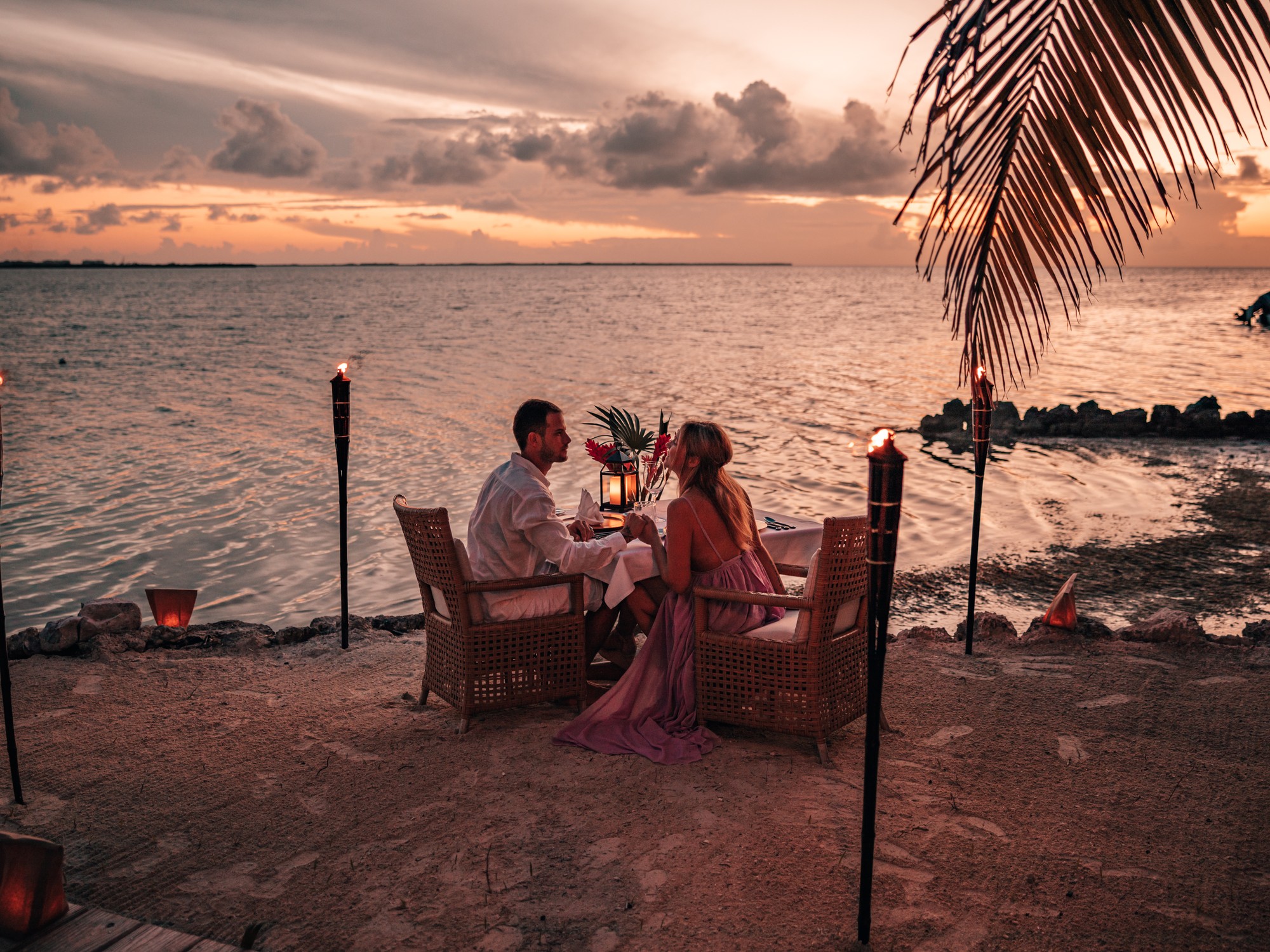 Sunset beach dinner at Cayo Espanto in Belize