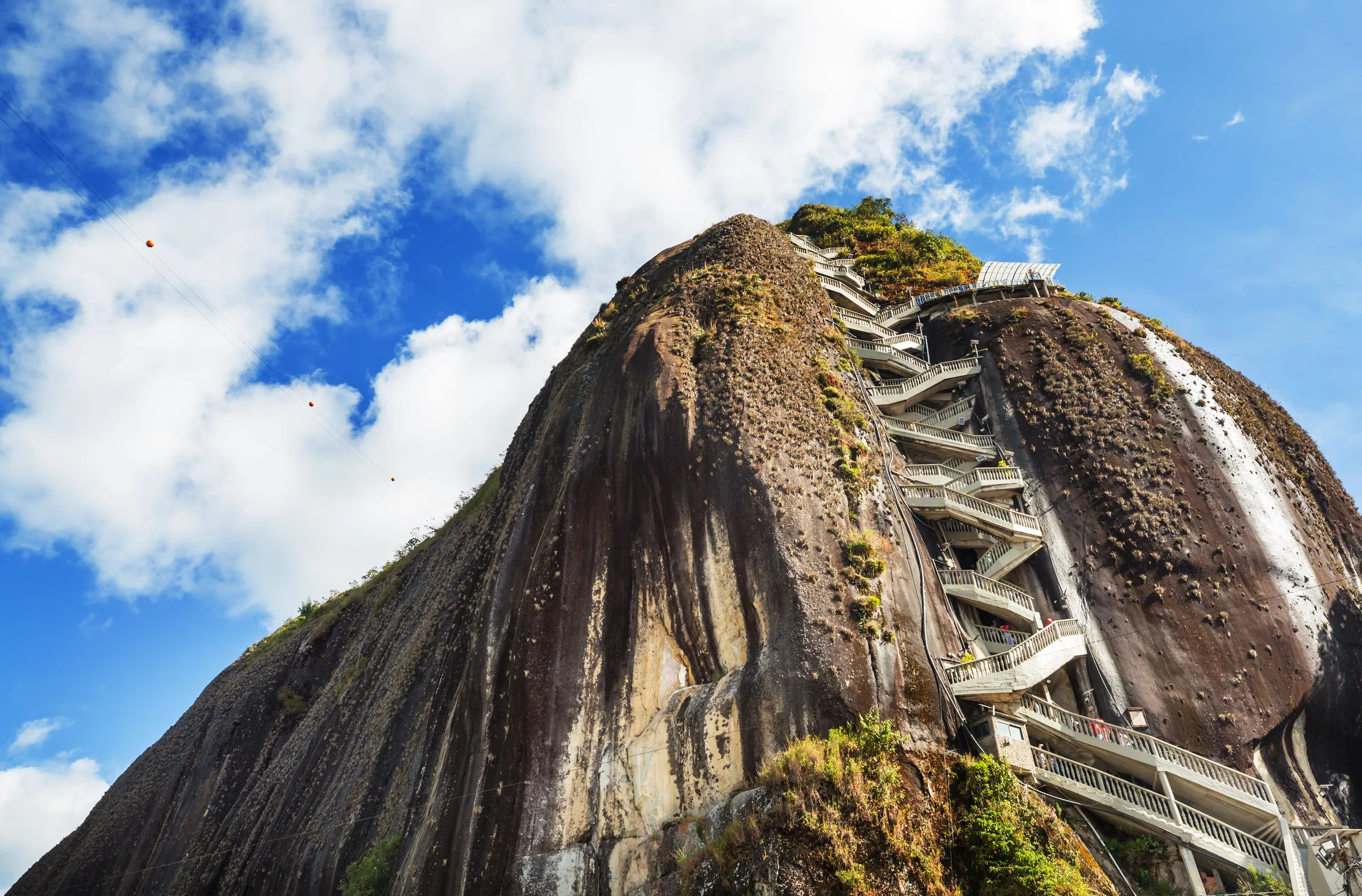 Zigzag stairway ascending the steep face of El Penol
