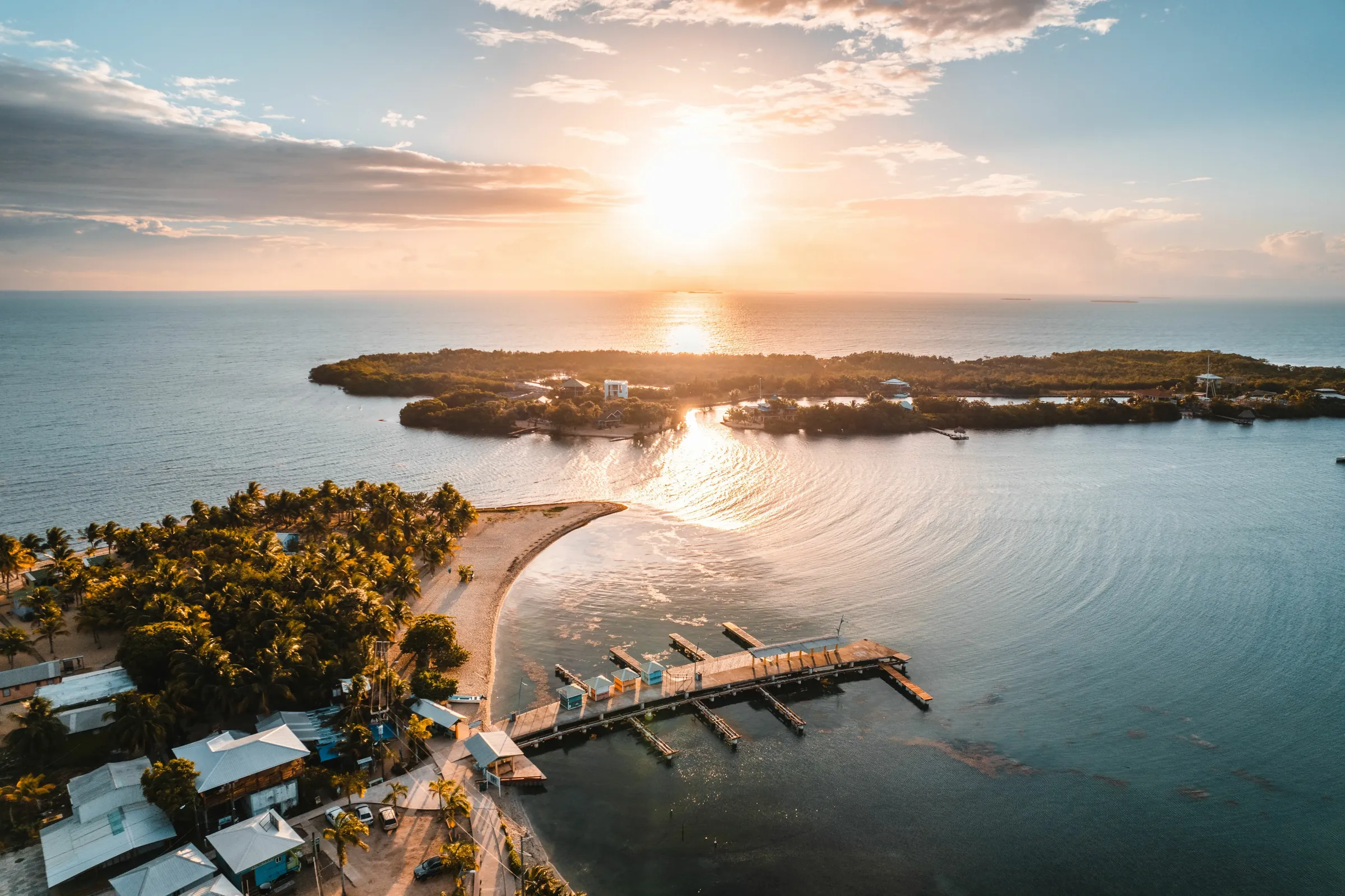 Sunset over Placencia and its coastal lagoon, seen from above