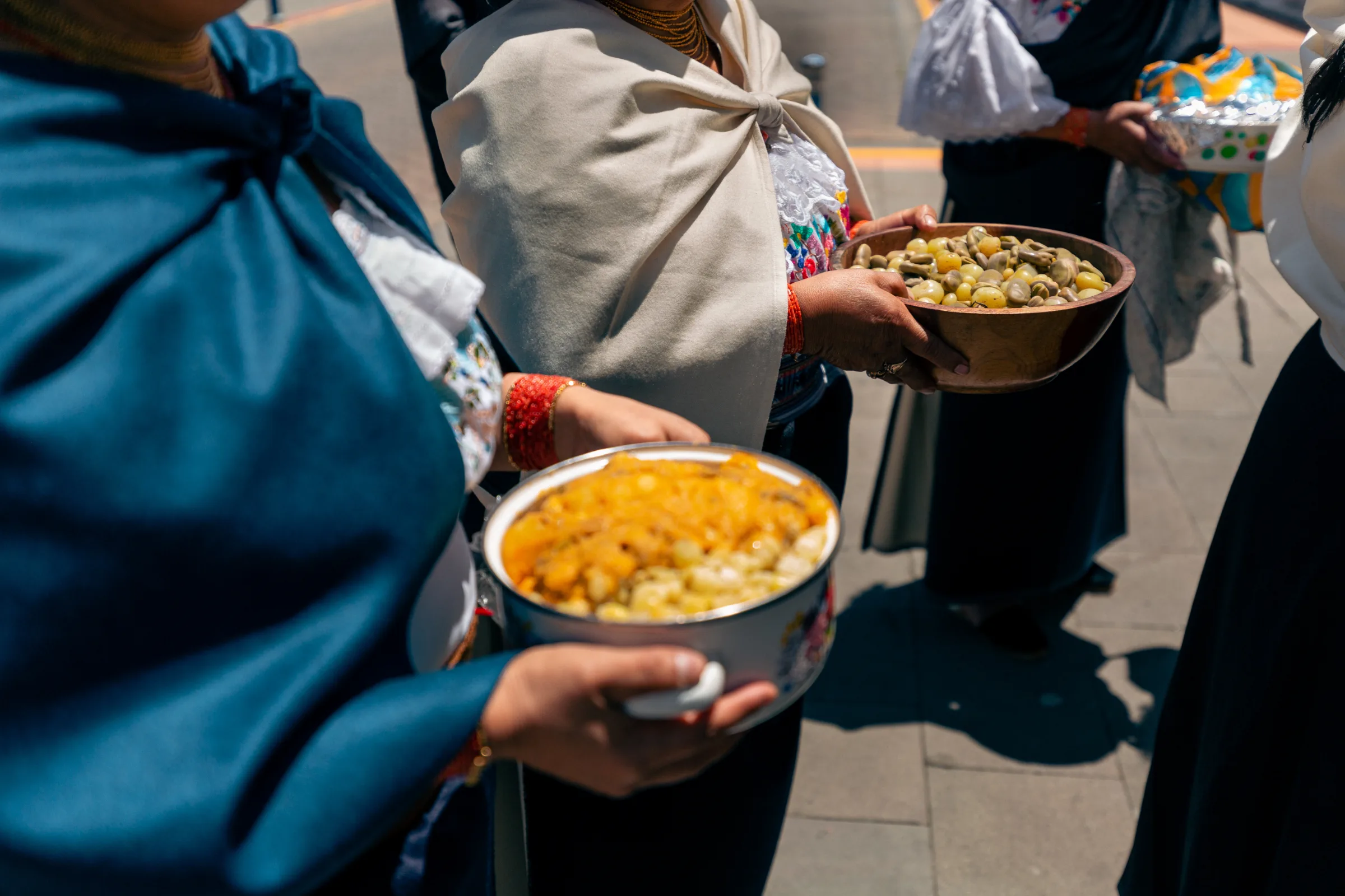 An Andean community ritual sharing food from the land in Otavalo, Ecuador