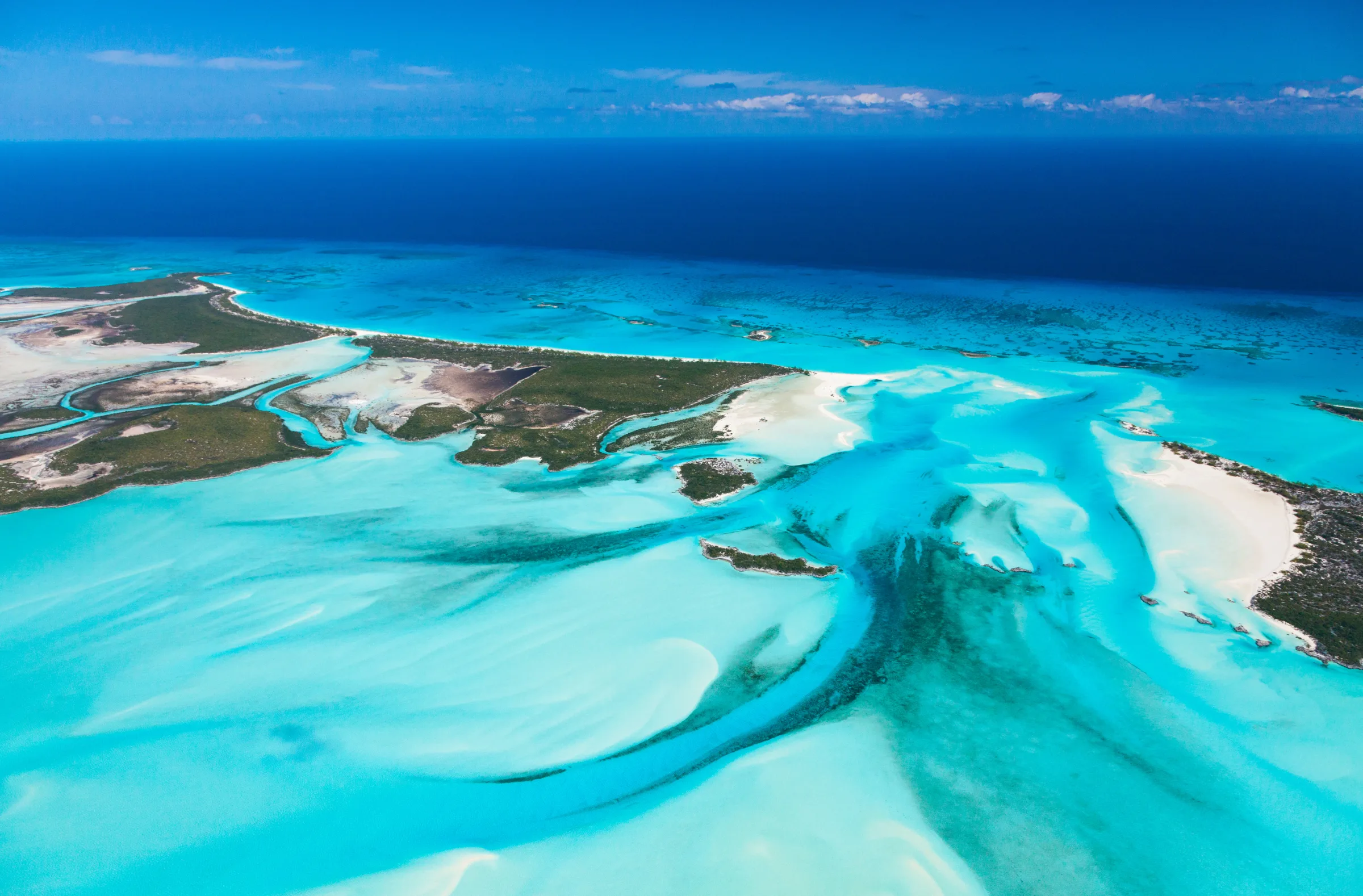 Aerial view of turquoise water and cays in the Exumas, Bahamas